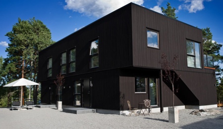 Maison en bois noire Nexthouse